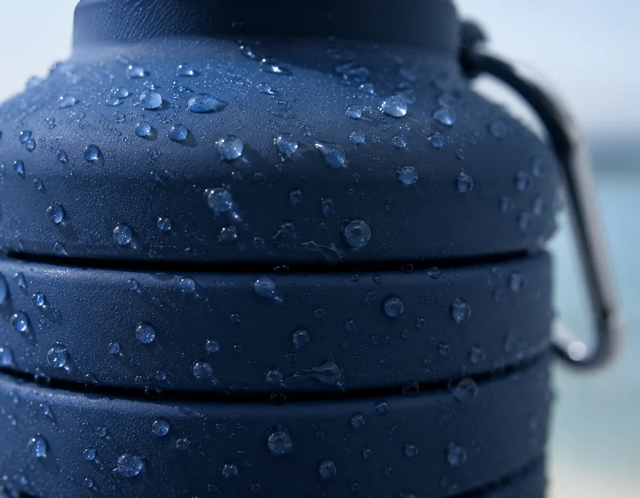 Water beading on the silicone body of a Slate collapsible bottle